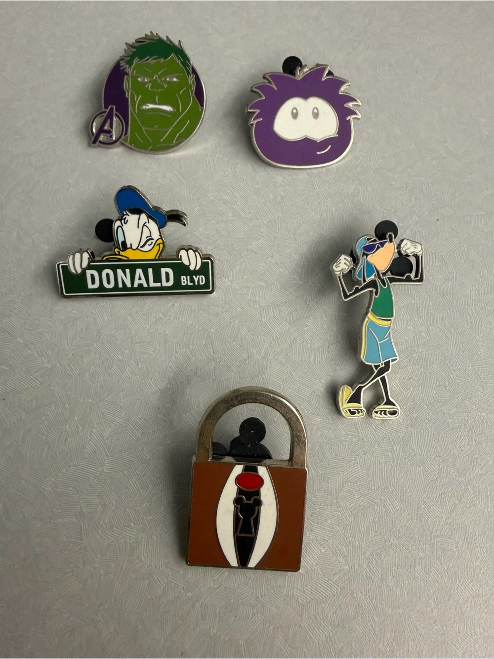 Disney Enamel Pin Lot – Green, Purple, Blue, Yellow, Black, Brown